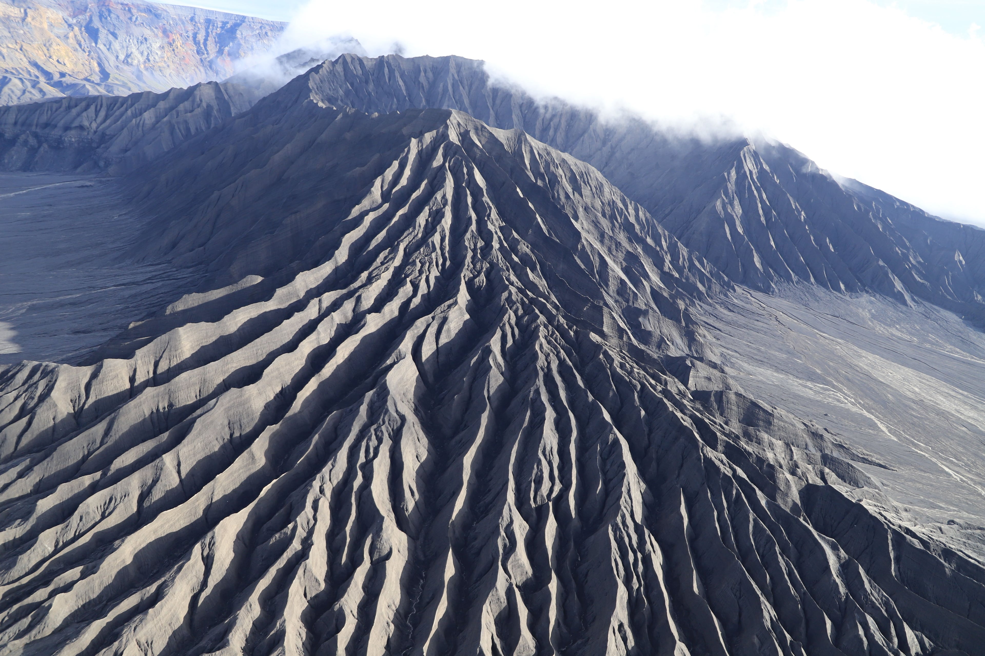 Ahmanilix cone, Okmok