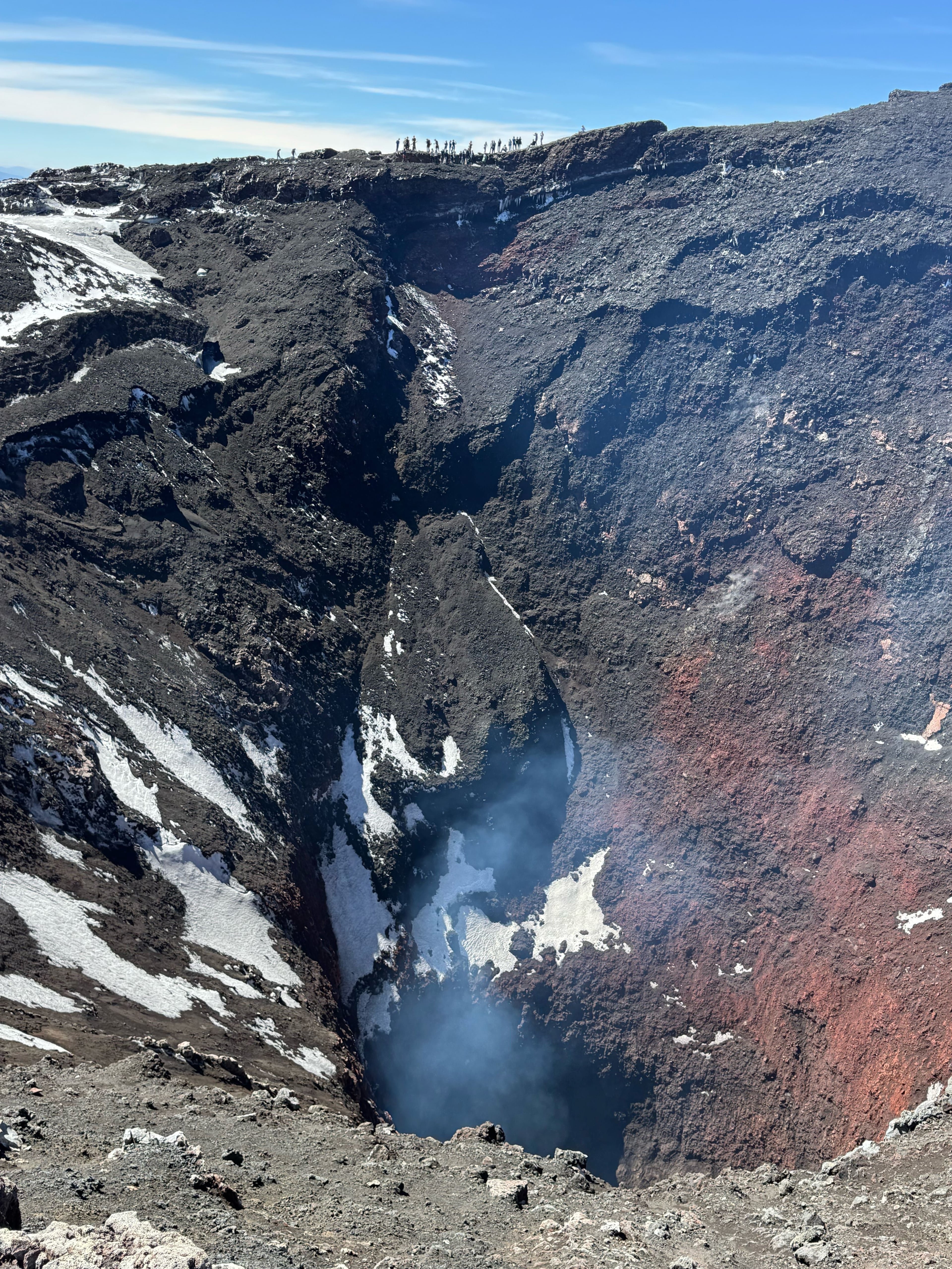 Visitors overlooking Villarrica’s open volcanic vent
