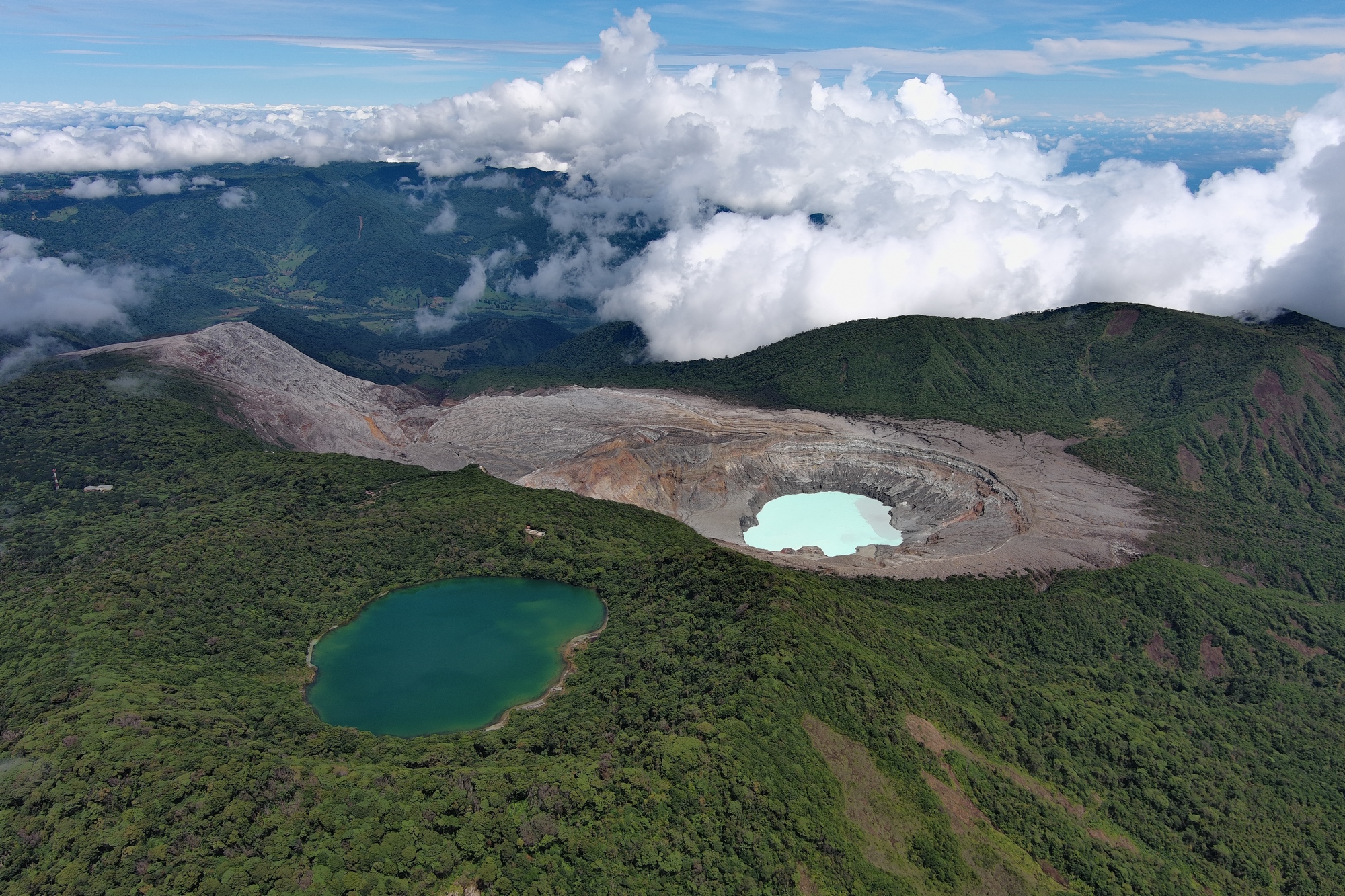 Overview of the Poás crater region, taken from a drone. The two crater lakes—Laguna Botos and the highly acidic Laguna Caliente—are visible. Credit: OVSICORI.